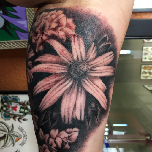 Explore power tattoo ideas, creative tattoo ideas in Reno, available at Aces Tattoo