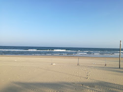 Quan Lan beach'in fotoğrafı uçurumlarla desteklenmiş