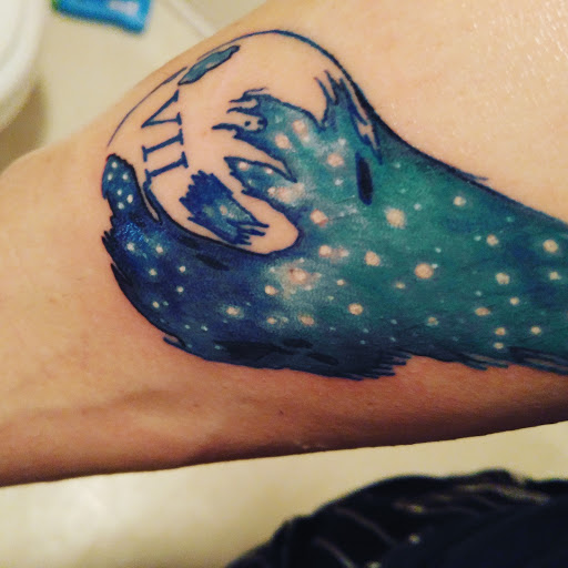 Explore kiss lip tattoo ideas, creative tattoo ideas in Winston Salem, available at Deja Vu