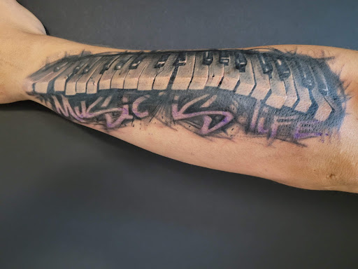 Explore transformers tattoo ideas, creative tattoo ideas in Columbia, available at Black Widow Tattoo