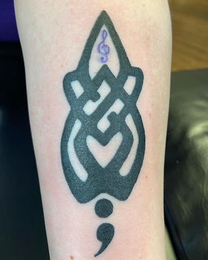 Explore animal tattoo ideas for guys, creative tattoo ideas in Muncie, available at Fox & Sparrow Tattoo