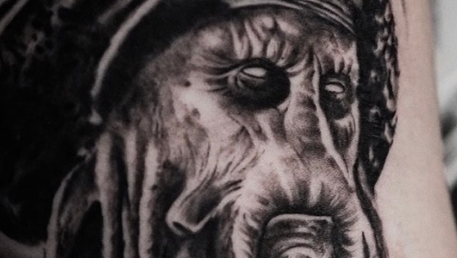 Explore tattoo ideas for guys with daughters, creative tattoo ideas in Fayetteville, available at Sacred Raven Tattoo Shop