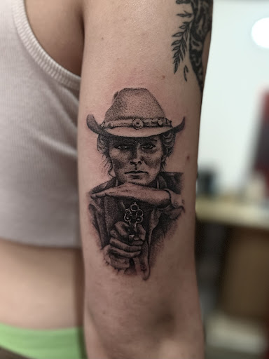 Explore addiction tattoo ideas, creative tattoo ideas in Lander, available at Blackblood Tattoo and Piercing