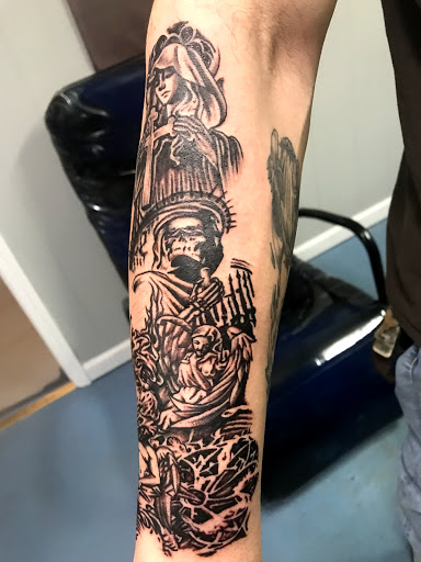 Explore tooled leather tattoo ideas, creative tattoo ideas in Muncie, available at The Tattoo Studio