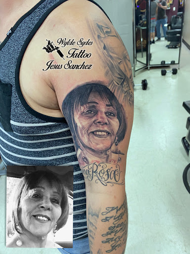 Explore tattoo ideas for dark skin men, creative tattoo ideas in San Diego, available at Wylde Sydes Tattoo & Body Piercing