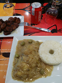 Poulet au curry du Restaurant de spécialités d'Afrique de l'Ouest Afrik'N'Fusion à Paris - n°3