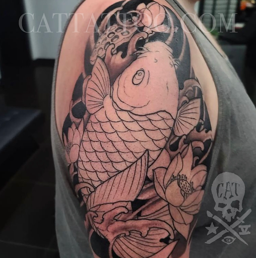 Find low back tattoo ideas for your next unique tattoo in Addison at Cat Tattoo