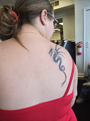 Explore handprint tattoo ideas, creative tattoo ideas in Westland, available at Premier Tattoo Company Westland