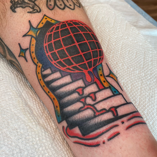 Explore small shoulder tattoo ideas, creative tattoo ideas in Sykesville, available at Americana Folk Tattoo