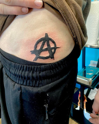 Find fish tattoo ideas for guys for your next unique tattoo in Traverse City at Pinups & Needles