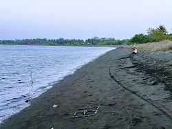 Foto di Dadap Hidden Beach con costa lunga e dritta