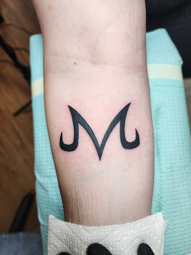 Explore sleeve tattoo filler ideas, creative tattoo ideas in Orlando, available at Cast Iron Tattoos