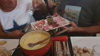Raclette du Restaurant CHALET REGAIN LES ROUSSES - n°12