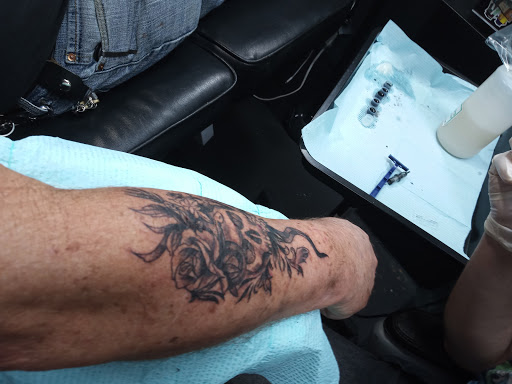 Explore up tattoo ideas, creative tattoo ideas in Largo, available at Alchemy Tattoos and Body Piercings