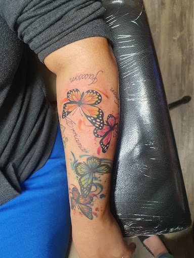 Explore rubber duck tattoo ideas, creative tattoo ideas in Eaton, available at Alley Cat Tattoos & Body