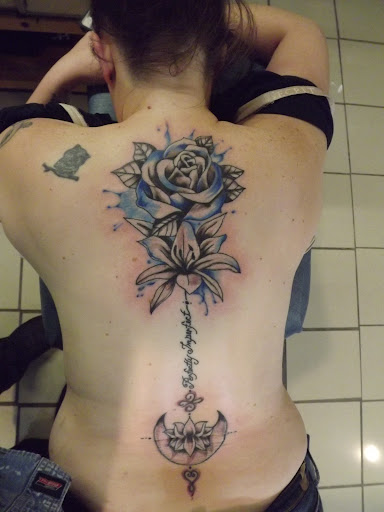 Explore tree tattoo ideas for females, creative tattoo ideas in Princeton, available at Custom Dreams Tattooing and Body Piercing