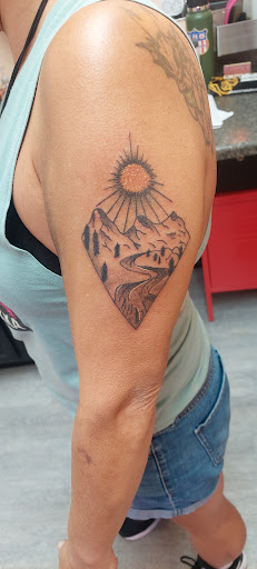 Explore trumpet tattoo ideas, creative tattoo ideas in Pitman, available at Mythic Ink Tattoo