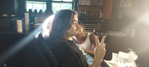 Find surrealism tattoo ideas for your next unique tattoo in Indianapolis at High Caliber Tattoo and Piercing Studio