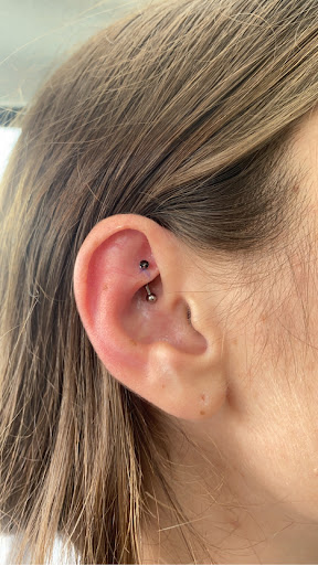 Explore ectopic pregnancy tattoo ideas, creative tattoo ideas in West Palm Beach, available at GURU Tattoo & Piercing - Palm Beach County