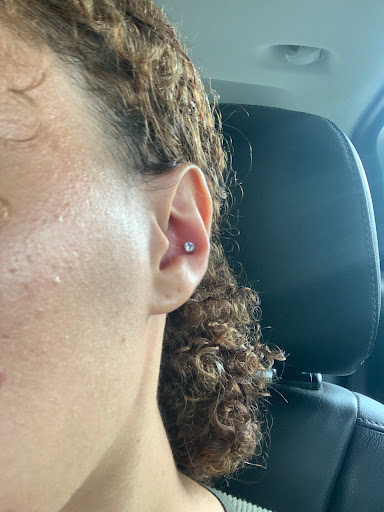 Explore black queen tattoo ideas, creative tattoo ideas in Milwaukee, available at Piercings Plus