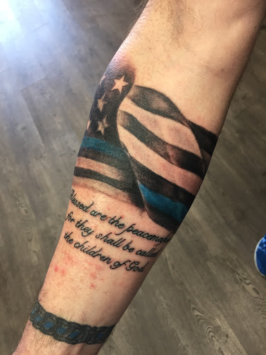 Explore strong woman tattoo ideas, creative tattoo ideas in West Lafayette, available at Renegade Tattoo Studio