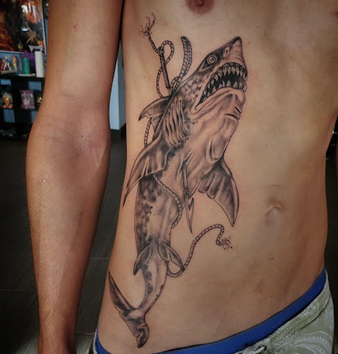 Explore siren tattoo ideas, creative tattoo ideas in Palm Harbor, available at Angry Owl Tattoo and Piercing