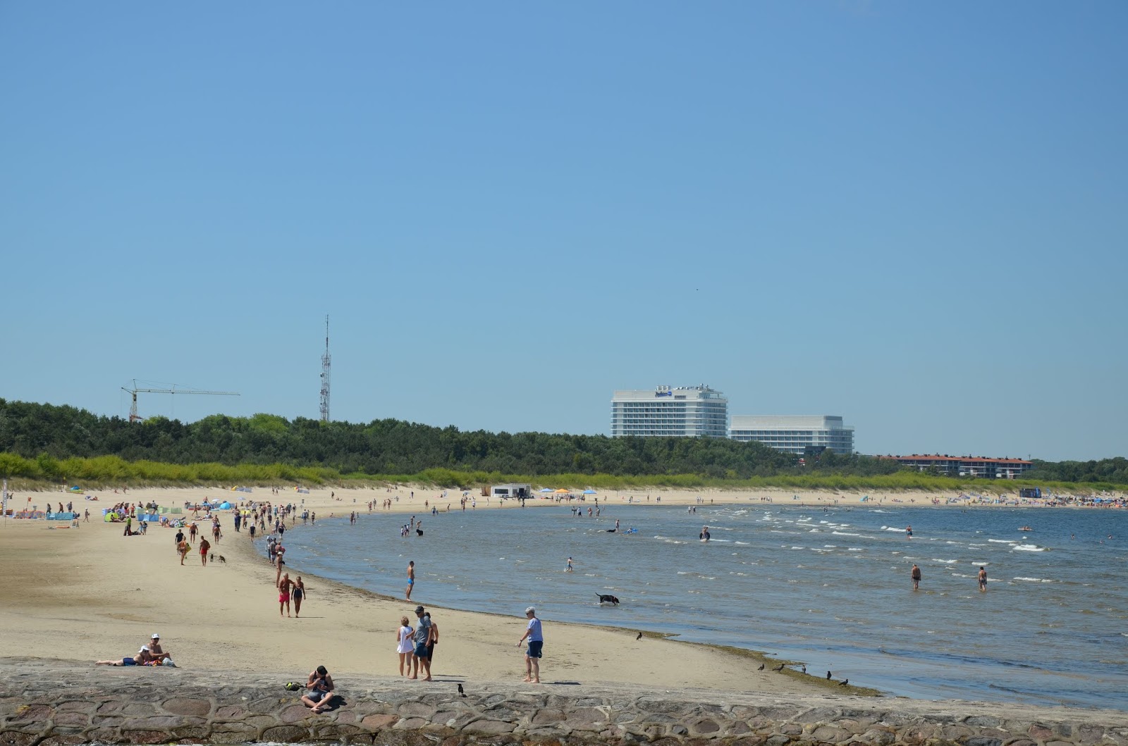 Foto di Swinoujscie Beach con una superficie del sabbia beige