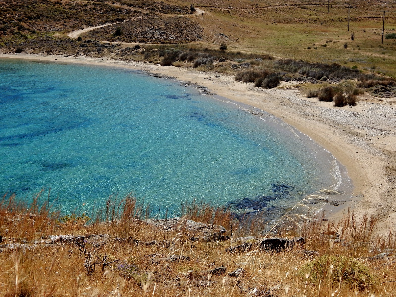 Foto von Kastri beach mit kleine, beiger kiesel Oberfläche