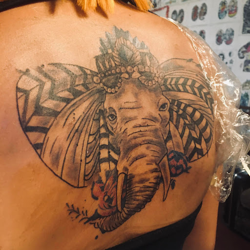 Explore first born daughter tattoo ideas, creative tattoo ideas in Memphis, available at Indigo Tattoos Shop