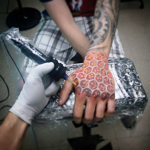Find tattoo necklace ideas for your next unique tattoo in Minneapolis at The Ink Tailor LLC