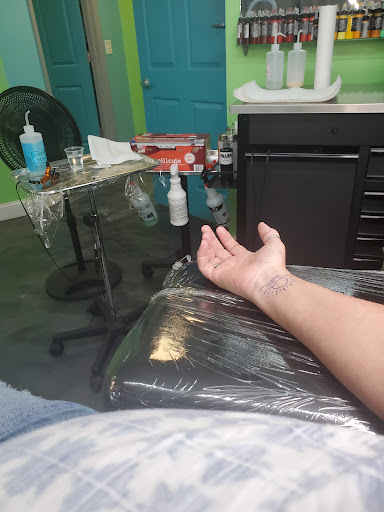 Explore name hand tattoo ideas, creative tattoo ideas in Saint Petersburg, available at Mad Beach Ink