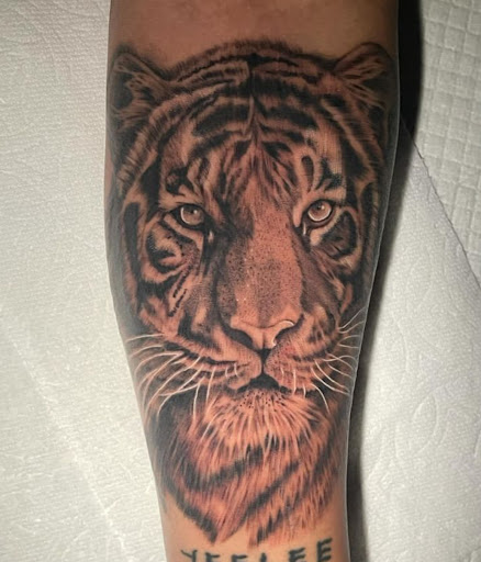 Explore tattoo ideas for adoption, creative tattoo ideas in Clovis, available at Clovis Ink Tattoo