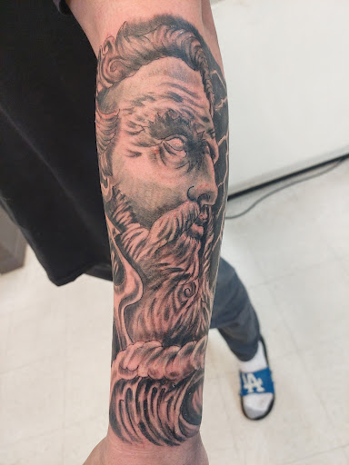 Explore bone tattoo ideas, creative tattoo ideas in Fort Mohave, available at RedRum Tattoo & Body Piercing Co.