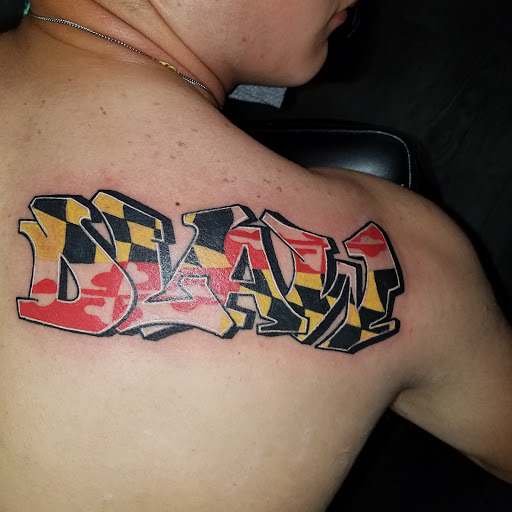 Find female breast tattoo ideas for your next unique tattoo in Prince Frederick at Red Octopus Tattoos