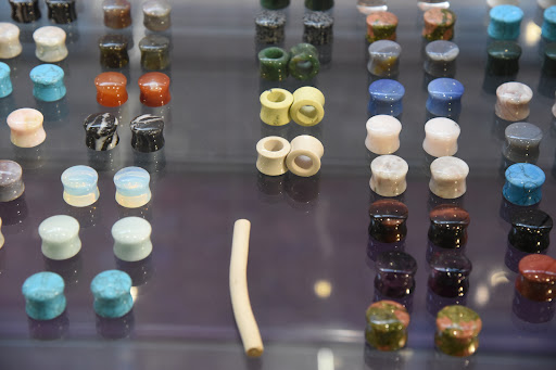 Explore green tattoo ideas, creative tattoo ideas in Kalamazoo, available at Kitten Flower Boutique Jewelry and Body Piercing