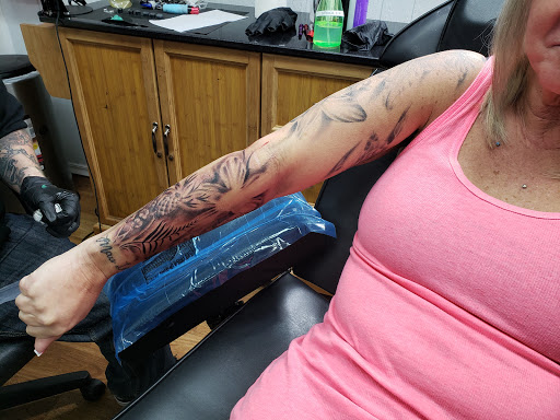 Explore money tattoos ideas, creative tattoo ideas in Orem, available at The Tattoo Shop