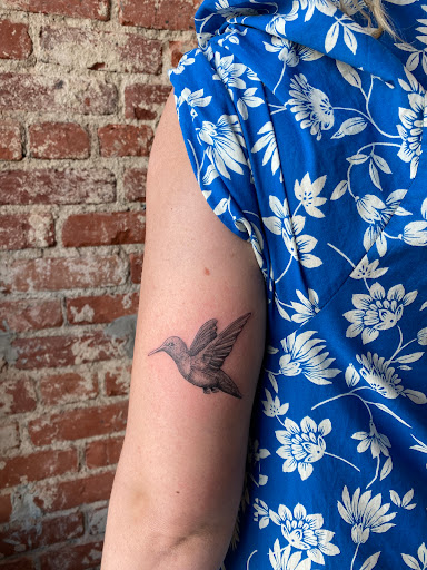 Explore sign language tattoo ideas, creative tattoo ideas in Venice, available at KISS KISS TATTOO & PIERCING