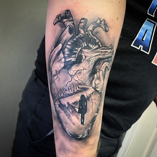 Find dragon tattoo idea for your next unique tattoo in Canfield at Black Rose Tattoo Studio
