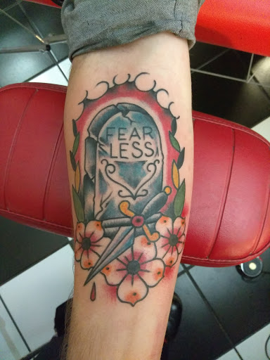 Find tattoos in between breast ideas for your next unique tattoo in Avon at Altered Image Tattoo and Piercing Studio