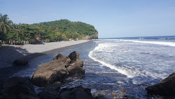 Photo de La Perla beach avec rivage droit, long