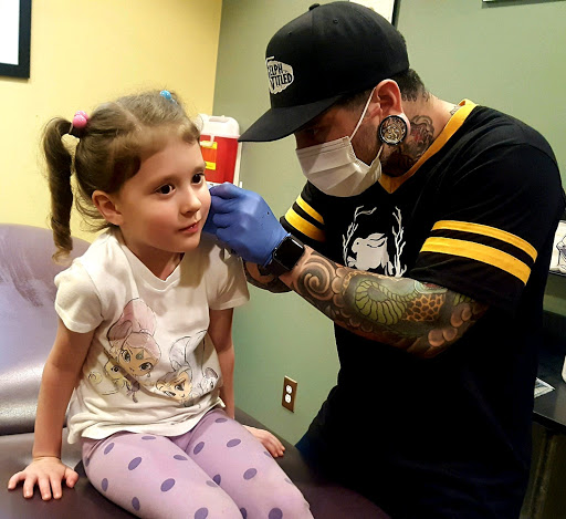 Explore tribal cross tattoo ideas, creative tattoo ideas in Salt Lake City, available at IRIS Piercing Studio and Jewelry Gallery