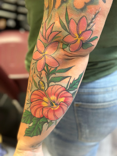Explore tattoo ideas for female thigh, creative tattoo ideas in Port Saint Lucie, available at Nevermore Tattoo studio