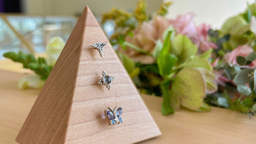 Explore fish tattoo ideas for females, creative tattoo ideas in Chattanooga, available at Monarch Fine Jewelry Professional Piercing