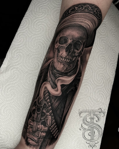 Find time clock tattoo ideas for your next unique tattoo in Lakeview at Backwoods Tattoo Studio