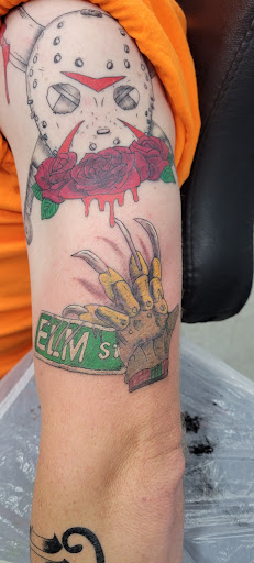 Explore black and white sleeve tattoo ideas, creative tattoo ideas in Jasper, available at Addictive Ink tattoo and piercing studio