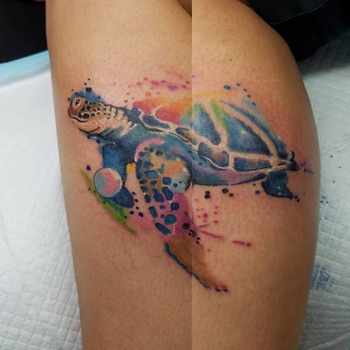 Explore rib tattoo ideas for women, creative tattoo ideas in Kearney, available at Babalus Professional Tattoo Studio