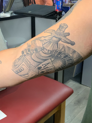 Explore cheetah tattoo ideas, creative tattoo ideas in Waterville, available at MADD INK Tattoo & Piercing Studio