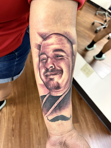 Explore alpha tattoo ideas, creative tattoo ideas in Austin, available at Capital City Tattoos LLC