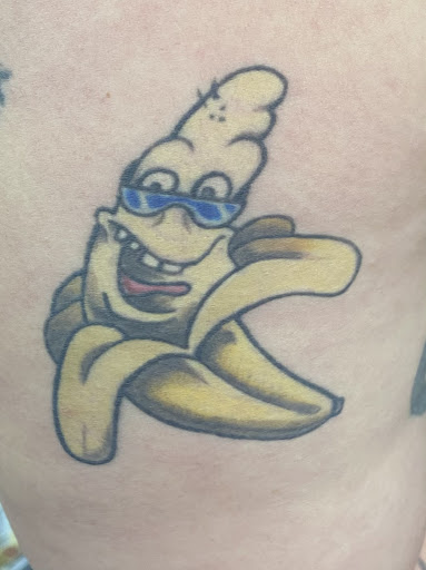 Explore purple flower tattoo ideas, creative tattoo ideas in Waterloo, available at Friki Tiki Tattoo and Gallery