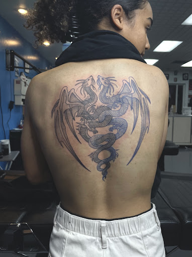Explore family flower tattoo ideas, creative tattoo ideas in Meridian, available at Creative Pain Tattoo Studio